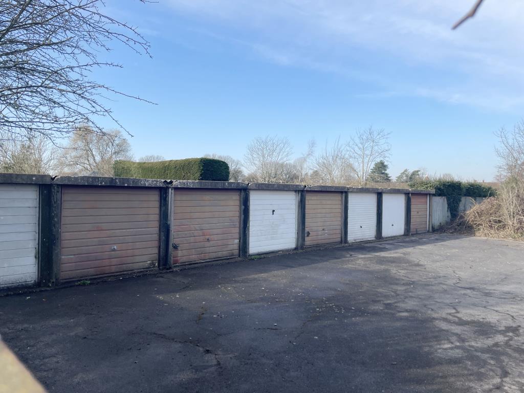 Lot: 5 - SEVEN GARAGES - view of garages in Marden